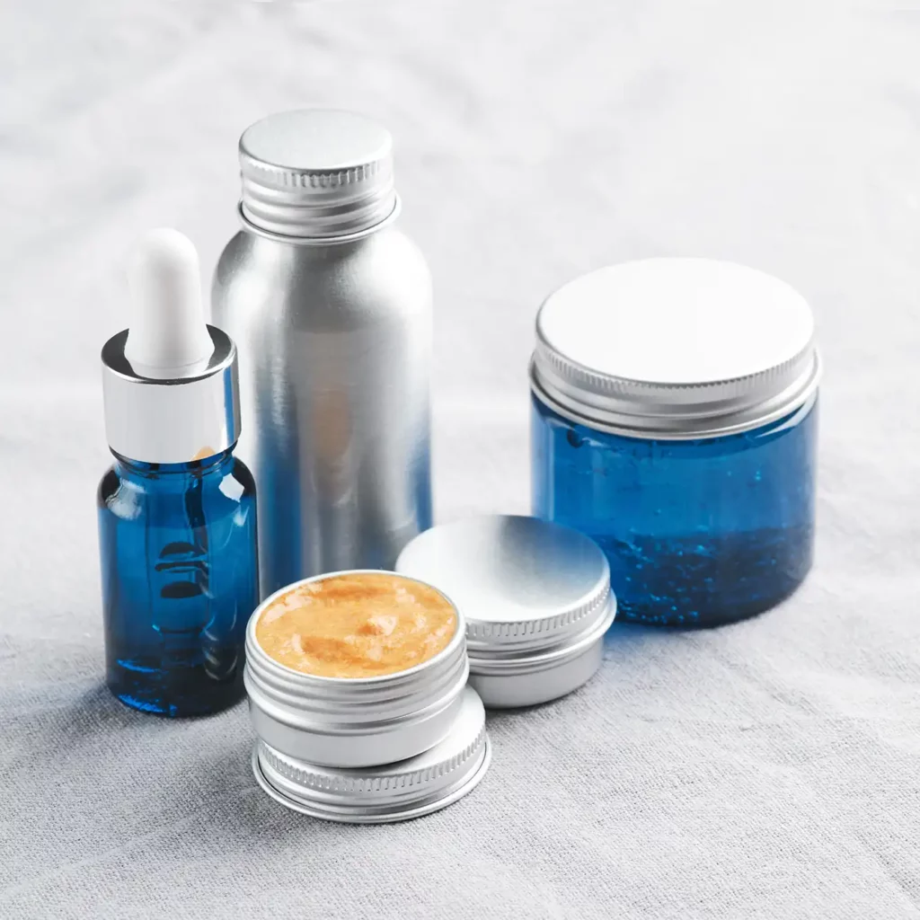 Medizinische Kosmetik Dermatologie Muenchen Sendlinger Tor set of metal and glass containers of natural cosmetics